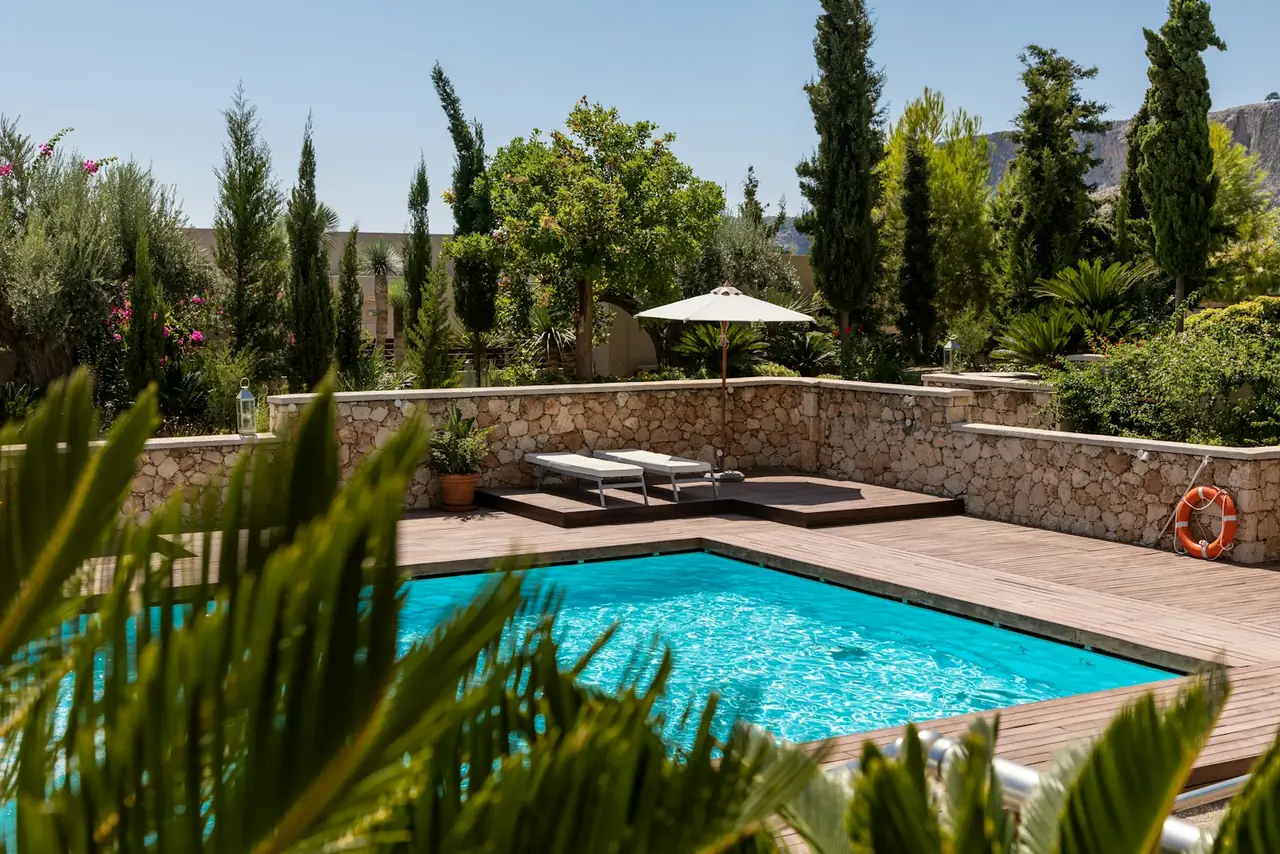 Crystal-clear pool in a landscaped garden