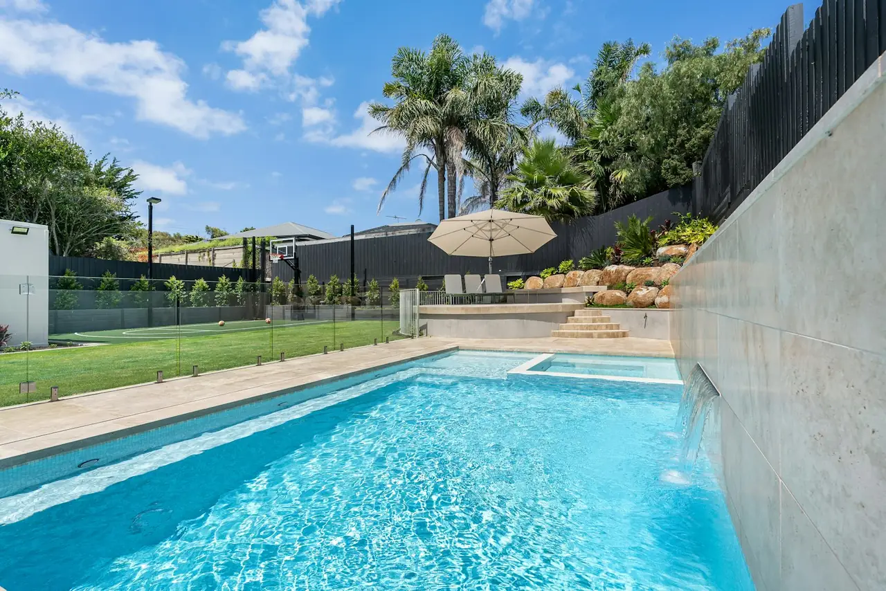 Sparkling blue backyard pool